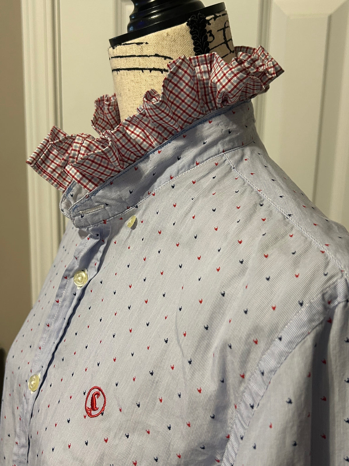 Ladies Up-Cycled El Ganso Light Blue Shirt with Navy Blue and Red Blips of color and a Plaid Ruffled Collar. Size S